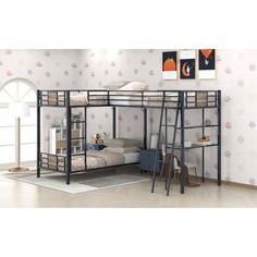 a bunk bed with ladders is shown in this room, and it has pink polka dot wallpaper on the walls