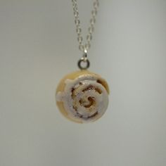 Super cute Cinnamon Bun necklace with Sterling Silver Chain!!! How cute is that!!!  These pendant measure approx. 0.5 inch in diameter. The necklace is approx. 18 inch long.  These products are made with many types of polymer clay, plastic, glass, metal, ceramic and much more. They are meant ... Cute Nickel-free Round Necklaces, Cute White Nickel-free Necklaces, Cute White Nickel Free Necklaces, Silver Polymer Clay Pendant Necklace, Nickel-free Polymer Clay Necklace Gift, Adjustable Polymer Clay Necklace For Gifts, Cute Handmade Round Pendant Necklace, Adjustable Polymer Clay Necklace As Gift, Cute Resin Necklaces For Gifts