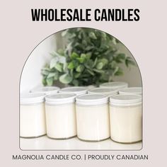 six candles are sitting on a table with the words wholesale candles in front of them