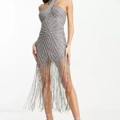 New Nwt Asos Design Halter Crystal Embellished Fringe Dress In Silver Is Such A Stunning Piece! This Gray Dress Is Covered In Stones And Beads In A Geometric Diamond Pattern. Criss Cross Halterneck And Metal Fringe With Rhinestones At Skirt. Back Zip Closure. Hook And Eyes Behind Neck. 100% Polyester. Size Us 4 *Please Note Photos There Is A Few Broken Fringes However Not Noticeable. There Could Be A Loose/Missing Stone Or Bead I Couldn’t Find Any But It’s Possible Approximate Measurements Lengt Luxury Evening Sequin Dress With Rhinestone Fringe, Geometric Diamond Pattern, Asos Dress, Fringe Dress, Geometric Diamond, Girls Night Out, Diamond Pattern, Gray Dress, Girls Night