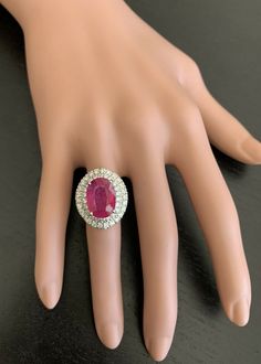 13.50 Carats Lab Created Ruby and Natural Diamond 14K Solid White Gold Ring Suggested Replacement Value $5,500.00 Total Ruby Weight is Approx. : 12.00 Carats Ruby Measures Approx. : 14 x 10mm Natural Round Diamonds Weight: Approx. 1.50 Carats (color G-H / Clarity SI1-SI2) Ring total weight: Approx. 10.0 grams Disclaimer: all weights, measurements and colors are approximate and may vary slightly from the listed dimensions or as seen in the image. All pictures are magnified to show the smallest of Luxury Marquise Ruby Ring With Diamonds, Luxury Gia Certified Ruby Ring, Exquisite Oval Ruby Ring Gia Certified, Luxury Gia Certified White Gold Ruby Ring, Gia Certified Fine Jewelry Ruby Ring In Platinum, Formal Oval Ruby Ring In Platinum, Oval Ruby Ring In Platinum For Formal Occasions, Gia Certified Platinum Ruby Ring In Fine Jewelry, Gia Certified Platinum Ruby Ring