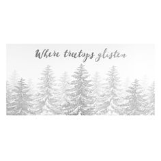 a white and silver christmas card with trees in the background