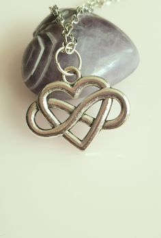 A lovely silver plated necklace with a heart and infinity symbol entwined  The necklace is 18 inches and an 1 inch extension and a lobster catch. To customise your order and make it more personal add an initial charm for £0.50 https://www.etsy.com/uk/listing/499381946/silver-initial-charm. I am happy to help with any queries of special requests, please send me a message. Silver Infinity Heart Necklace For Anniversary, Silver Double Heart Necklaces For Friendship, Infinity Necklace With Lobster Clasp As Gift, Silver Heart Charm Necklace For Friendship, Infinity Heart Necklace In Sterling Silver For Gift, Sterling Silver Infinity Heart Necklace As Gift, Elegant Silver Charm Necklaces For Friendship, Elegant Silver Charm Necklace For Friendship, Silver Double Heart Necklace For Friendship