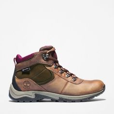 a women's hiking boot with laces on the outstep and side zipper