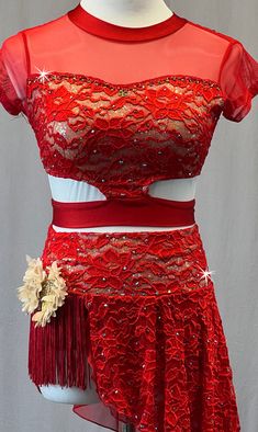 Red lycra top has cutout on sides of each ribcage and keyhole opening in back. Sweetheart neckline and down is covered in Red floral lace. Shoulders and cap sleeves are Red mesh. Skirt is asymmetrical with two layered side skirt on left side. Bottom layer is Red mesh and comes to a longer point, top layer is Red lace and is cut straight across. Red fringe on right hip with Cream flower attached. Wow! Over 4 gross of Light Siam 30ss, and Light Siam AB 20ss. **Accessories include matching Cream Fl Fitted Red Top With Lace Trim, Fitted Red Tops With Lace Trim, Trio Costumes, Sequin Jewelry, Costumes Couture, Red Fringe, Cream Flower, Sequin Appliques, Tutu Costumes