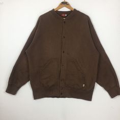 Vintage Dickies sweatshirt in brown colour. Full button sweatshirt with separate kangaroo pocket. Still in good condition. SEE THE PICTURES FOR MORE DETAILS. CONDITION : 9/10 MEASUREMENT Pit : 26.5 inch Length : 30 inch Arm Length : 24 inch Size On Tag : XL PAYMENT We accept PayPal only. The item will be ship 3-5 days once the payment has been made. SHIPPING $30 (from Malaysia to the rest of the world) We are using normal POS MALAYSIA (Malaysia Postal Service) It gonna take about 21-30 days or m Fall Streetwear Brown Cardigan, Brown Cardigan For Fall Streetwear, Brown Fall Cardigan For Streetwear, Brown Cotton Cardigan With Button Closure, Casual Brown Cotton Cardigan, Brown Long Sleeve Cotton Cardigan, Streetwear Long Sleeve Cardigan With Pockets, Oversized Brown Buttoned Sweater, Oversized Brown Sweater With Ribbed Cuffs