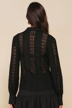 Everyone will adore your style in a signature look like the Lulus Unique Effect Black Lace Sheer Long Sleeve Button-Up Top! Lightweight woven fabric, with panels of sheer lace, shapes this eye-catching top that has long balloon sleeves with solid button cuffs and a collared neckline. Fitted bodice has a functional button placket at front to secure the look. Bralette not included. Fit: This garment fits true to size. Length: Size medium measures 24.5" from shoulder to hem. Bust: Great for any cup Sheer Button-up Workwear Tops, Sheer Button-up Tops For Workwear, Sheer Button-up Tops For Night Out, Sheer Button-up Top For Fall, Sheer Sleeves Button-up Tops For Fall, Fall Sheer Sleeves Button-up Tops, Fall Button-up Top With Sheer Sleeves, Sheer Fitted Button-up Blouse, Fitted Sheer Button-up Blouse