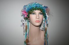 Totally unique! One in the world! Ready To Ship! Soft and fairy-like! Hand Made Freeform knitted forest Mermaid fairy Hat! Unique. One Of A Kind Wearable Art.  Makes a lovely gift! Comes Gift Wrapped! Lovely colours, blue, green, pink, lilac purple and white tones.  You will be the only one in the world to wear this hand made knitted item! Each item that I make is slightly different because it's hand made and colours vary. You will be receiving the actual item in these photos, it's already made Whimsical Crochet Hat For Festivals, Bohemian Crochet Mini Hats, Whimsical Handmade Multicolor Costume Hats And Headpieces, Whimsical Handmade Crochet Hat For Festival, Whimsical Handmade Crochet Festival Hat, Bohemian Yarn Mini Hats, Bohemian Mini Hats In Yarn, Handmade Whimsical Crochet Hat For Festivals, Whimsical Handmade Crochet Hat