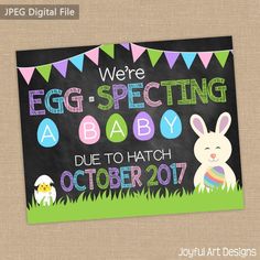 an easter chalkboard sign with bunnies and eggs