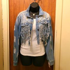 Blue Distressed Crop Jean Jacket Size Large New With Tag Casual Medium Wash Outerwear With Fringe, Blue Outerwear With Frayed Hem For Fall, Denim Long Sleeve Outerwear With Fringe, Long Sleeve Denim Outerwear With Fringe, Fitted Winter Outerwear With Frayed Hem, Blue Frayed Hem Outerwear For Winter, Blue Winter Outerwear With Frayed Hem, Blue Fringe Outerwear For Fall, Fitted Distressed Blue Outerwear