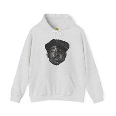 Embrace the legacy of two hip-hop icons with our Tupac and Notorious BIG Half Faces Hoodie! This Gildan 18500 hoodie features a striking design combining the faces of Tupac Shakur and Notorious BIG into one cohesive image. Perfect for keeping warm in style, this hoodie is a must-have for fans of 90s rap and music history. Key Features: Half faces of Tupac Shakur and Notorious BIG Gildan 18500 hoodie for comfort and warmth High-quality graphic print Ideal gift for hip-hop fans Unisex fit suitable 90s Letter Print Hoodie For Streetwear, 90s Style Letter Print Hoodie For Streetwear, 90s Style Hoodie Sweatshirt With Graphic Print, 90s Hooded Sweatshirt With Graphic Print, 90s Hooded Graphic Print Sweatshirt, 90s Style Graphic Print Hoodie Sweatshirt, Hip Hop Hoodie With Adjustable Hood For Streetwear, 90s Streetwear Hoodie With Crew Neck, Pop Culture Fan Merchandise Hoodie For Winter