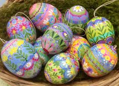 painted easter eggs in a wicker basket