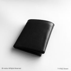 Crafted from 100% genuine leather for durability and style. Sleek trifold design with multiple card slots and ID window. Compact and secure with a modern, elegant finish. Ideal for everyday use or as a gift. Upgrade your everyday essentials with this Genuine Leather Men's Trifold Wallet. Crafted from premium 100% genuine leather, it offers durability and a modern, sleek design. With multiple card slots and an ID window, it combines functionality with style. Compact yet spacious, it's perfect for daily use and makes an ideal gift for the discerning gentleman who values quality and elegance. Modern Trifold Card Holder With Coin Pocket, Modern Rfid Blocking Trifold Card Holder, Modern Trifold Rfid Blocking Card Holder, Black Leather Trifold Wallet For Business, Formal Trifold Wallet With Interior Card Slots, Formal Trifold Wallet With Card Slots, Modern Black Leather Trifold Wallet, Modern Black Trifold Wallet, Classic Black Trifold Wallet For Business