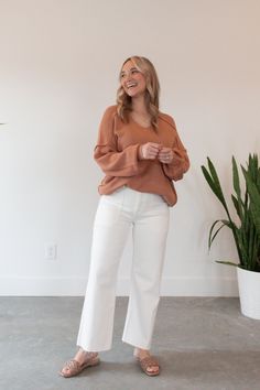 Add a slight pop of color to your spring wardrobe with our Sav Coral Oversized Sweater! This piece is the perfect extra layer. Pair with your favorite denim or shorts. Oversized fit Lightweight Long sleeve Balloon sleeve V-neckline Non see through True to size Machine wash cold 100% Acrylic Model wearing size M/L Model measurements:- Height: 5'4- Bust: 34"- Waist: 29"- Hip: 38" Trendy Spring Sweater With Pockets, Oversized Tops With Frayed Hem For Fall, Spring Sweater With Pockets For Day Out, Effortless Tops For Fall Day Out, Effortless Tops For Day Out In Fall, Trendy Relaxed Fit Spring Sweater, Oversized Casual Spring Sweater, Relaxed Fit Top For Day Out In Fall, Casual Oversized Sweater For Spring