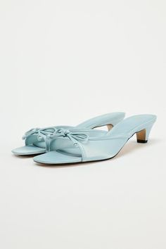 HEELED MULES WITH BOW - Blue | ZARA United States Elegant Summer Slip-on Kitten Heels, Summer Light Blue Low Heel Shoes, Chic Blue Kitten Heels For Spring, Summer Synthetic Low Heel Kitten Heels, Summer Synthetic Kitten Heels With Low Heel, Light Blue Pointed Toe Sandals For Spring, Spring Light Blue Pointed Toe Sandals, Summer Flat Mules With Padded Heel, Blue Pointed Toe Kitten Heels For Summer