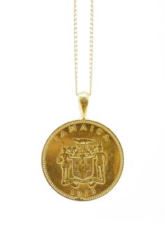 THE JAMAICAN Ackee Coin Necklace Traditional Round Jewelry For Commemoration, Traditional Engraved Round Coin Necklace, Traditional Coin Medallion Necklace For Gift, Traditional Coin Medallion Necklace As A Gift, Traditional Engraved Medallion Coin Necklace, Round Coin Necklace For Commemoration, Traditional Coin Pendant Necklace For Gift, Traditional Brass Coin Necklace, Traditional Coin Necklace As A Gift