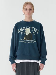 Editor's NotesThis relaxed sweatshirt is printed with graphic artwork of MARTINPLAN lettering logo, text and lamb character from little prince. It has overfit silhouette with drop shoulder and just suitable length to layer over t-shirt.- Crew neck- Graphic print on the front- Dropped shoulder - Ribbed edges- Oversized fit- Minimized shrinkageMeasurements (in.) S / M / L- Total Length: 25.2 in. / 26.0 in. / 26.8 in.- Shoulder: 25.6 in. / 26.4 in. / 27.2 in.- Chest: 25.6 in. / 26.6 in. / 27.6 in.  - Sleeve Length: 23.2 in. / 23.6 in. / 24.0 in. Model info:- Man 1: 6' 2.0 / Fitting size Outer L, Top L, Bottom 48(+1.2)- Man 2: 5' 11.7 / Fitting size Outer L, Top L, Bottom 48(+1.2) - Man 3: 5' 10.1, 172.0 lbs / Fitting size LComposition & Care- 100% Cotton- Recommend hand wash- Do not tumbl Oversized Blue Sweatshirt With Letter Print, Oversized Blue Sweatshirt With Screen Print, Blue Crew Sweatshirt With Text Print, Blue Relaxed Fit Sweatshirt With Slogan, Blue Crew Neck Sweatshirt With Slogan, Lamb Character, Lettering Logo, Logo Text, Little Prince