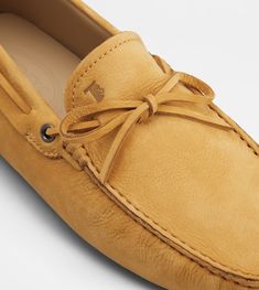 Man YELLOW Gommino Driving Shoes in Nubuck XXM0GW054706RN9MG410 | Tods Driving Moccasins With Leather Sole And Suede Material, Elegant Suede Driving Moccasins, Luxury Suede Driving Loafers, Classic Formal Moccasins With Woven Sole, Luxury Calf Leather Moccasins For Driving, Luxury Leather Sole Moccasins For Driving, Luxury Calf Leather Driving Moccasins, Luxury Leather Sole Driving Moccasins, Luxury Leather-sole Driving Moccasins