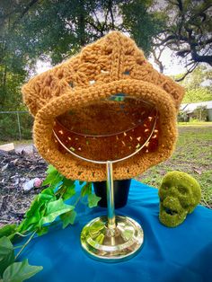 a crocheted hat sitting on top of a table