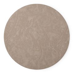 a round leather table top on a white background