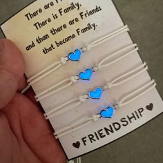 Set of 4 Friendship bracelet set which glow in the dark. If you look for a really unique gift idea for your best friends you found the one. The bracelets are fully adjustable with white leather string and heart charm in the middle. You can personalize the display card with your own message. Delivery 🚚  - 1st class Royal Mail delivery It takes 1-2 working days - Royal Mail International delivery It takes 5-7 working days to arrive Please note i need 1-2 working days to process your order. 💌 If Trendy Luminous Jewelry For Gifts, Luminous Adjustable Bracelets As Gifts, Valentine's Day Luminous Jewelry Gift, Luminous Jewelry For Valentine's Day Gift, Hypoallergenic White Friendship Bracelets As Gift, White Bracelets For Best Friend Gift Valentine's Day, White Bracelets For Best Friend Gift On Valentine's Day, White Casual Friendship Bracelets For Valentine's Day, Casual White Friendship Bracelets For Valentine's Day