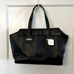 New With Tags - Perfect Condition. Lovely Lovely Genuine Leather, Black Structured Handbag. Two Large Side Pockets, Zippered Pocket Inside As Well As Two Smaller Open Pockets. Clean And Roomy! Silver Metal Zipper And Hardware Detail. Soft Black Leather With Very Cool Shimmery Textured Leather Detail On Trim. This Bag Has Never Been Used. I Love It But It’s Never Quite Fit My Style And So It’s Been Stored In My Smoke-Free Home, Safely Away From The Elements. Measures Approximately: 15” X 5” And 1 Business Satchel Shoulder Bag With Silver-tone Hardware, Business Shoulder Bag Satchel With Silver-tone Hardware, Elegant Travel Bags With Silver-tone Hardware, Modern Silver Bag For Business, Classic Satchel With Silver-tone Hardware In Tote Shape, Classic Satchel Tote With Silver-tone Hardware, Business Bag With Silver-tone Hardware And Double Handle, Professional Bag With Silver-tone Hardware And Double Handle, Classic Tote Shoulder Bag With Silver-tone Hardware