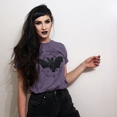 "The Original Stay Spooky Bat Shirt * cute gothic horror shirts * choice of ringer or basic tshirt * CHECK SIZE INFO BELOW ♥ My Stay Spooky Bat design is the original I drew myself. Don't be fooled by people stealing my photos & work ♥ Due to the number of counterfeits I've updated the design in Aug 2019. Some black shirts may still have the original design ♥ * 100% cotton for tees 50/50 cotton poly ringers * machine wash cold inside out is best * eco-friendly water based ink * available in Bat Graphic, Horror Shirts, Bat Shirt, Bat Design, Goth Shirt, Stay Spooky, Cute Bat, Gothic Horror, Branded Shirts