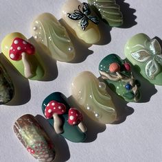 enchanted forest custom set 🍄🌳✨ vine nail ib @setsxnenita mushrooms ib @innerbloom.nails . . . #pressonnails #pressonnailbusiness #nailart #naildesign #3dnailart #handpaintednailart #enchantedforest #forestnails #naturenails #mushroomnails #butterflynails Mushroom Press On Nails, Pretty Press On Nails, Short Mushroom Nails, Mossy Nails, Enchanted Nails Design, Forest Nails Designs, Forest Fairy Nails, Aesthetic Nails Spring, Trippy Mushroom Nails