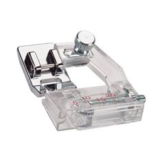 a clear plastic sewing machine on a white background