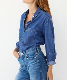 This lightweight denim shirt is a world-renowned concert pianist who's made waves in the classical music scene for (among many other things) her sartorial commitment to the Texas Tuxedo instead of the traditional black wool penguin suit. She's regarded among those who follow her iconic, bestselling button down sisters--The Deep Ends in Oxford and ﻿Cotton Poplin)--as the sister with *the best* interior design taste. She's won awards for her flower arranging skills and, rumor has it, will sketch t Classic Medium Wash Shirt For Work, Classic Dark Wash Tops For Work, Classic Dark Wash Tops For Workwear, Classic Dark Wash Tops With Pockets, Classic Denim Blue Tops With Pockets, Fall Workwear Medium Wash Shirt, Classic Everyday Shirt In Dark Color, Classic Medium Wash Tops For Fall, Indigo Shirt For Workwear In Fall