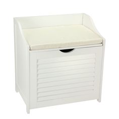 a white toy chest with a cushion on top