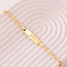 For moms in search of a creative and unique gift for their toddlers and little boys, this enchanting engravable plain rectangular identification tag bracelet is a thoughtful choice for any occasion. Crafted exclusively in 14k Yellow Gold, it ensures safety and comfort for babies and children during their everyday adventures. Order this classic ID bracelet today, and we'll ensure it's presented elegantly in its very own charming gift box, adding an extra touch of delight to your thoughtful gestur Gold Braces, Boys Bracelet, Boys Bracelets, Make Your Own Bracelet, Medical Bracelet, Kids Bracelets, Men Bracelet, Baby Bracelet, Everyday Adventures