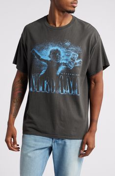 The cover of the grunge band's best-selling album is repeated on this all-cotton T-shirt. 29" length Crewneck Short sleeves 100% cotton Machine wash, tumble dry Imported Acid Wash Alternative Style T-shirt With Screen Print, Washed Band Merch T-shirt For Streetwear, Band Merch Washed T-shirt For Streetwear, Alternative Style Washed Black Graphic T-shirt, Alternative Washed T-shirt For Streetwear, Washed Black Crew Neck T-shirt With Band Merch, Relaxed Fit Washed Black Band Merch T-shirt, Alternative Style Washed T-shirt For Streetwear, Washed Black Cotton T-shirt Band Merch