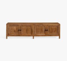 the sideboard is made from wood and has three doors on one side, two drawers on