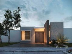 an image of a modern house at dusk