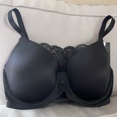 With 5 Different Strap Positions, The Le Mystere Convertible Plunge Bra Is An Ideal Everyday Piece. This Convertible Bra Features A Detachable Lace Panel That Shifts The Silhouette From A Cami Bra To Racerback In Merely Seconds. The Contour Memory Foam T-Shirt Cups Provide An Ultra-Soft Feel That Will Have You Sitting Comfortably All Day. Pair This Plunge Bra With Virtually Any Top In Your Wardrobe! Black Full Cup Bra With Medium Bust Support, Black Full Coverage Bra With Padded Cups, Black Full Coverage Padded Bra, Full Coverage Black Bra With Medium Bust Support, Black Full Coverage Bra With Medium Bust Support, Black Full Cup Bra With Removable Pads, Classic Black Bra With Medium Bust Support, Classic Black Bra With Removable Pads, Elegant Seamless Bra For Night Out