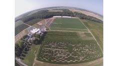 an aerial view of a large field that has been carved into the shape of words