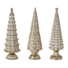 three gold colored christmas trees are shown in this image, one is white and the other is silver