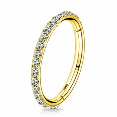 a yellow gold wedding ring with three rows of diamonds on the inside and outside of it