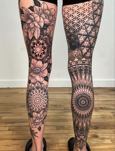 the legs and ankles of a woman with tattoos on her body are covered in intricate designs