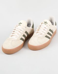 Adidas Gazelle Adv Shoes. A Skateboarding Version Of The Classic Adidas Gazelle Sneakers, These Shoes Have Higher Foxing Tape And A Super Grippy Outsole. A Double-Layered Toe Adds Durability, While A Molded Sockliner Offers An Elevated Fit. Lace Closure. Premium Suede Upper. Adituff Toe Reinforcement And Double-Layered Toe For Increased Durability. Gazelle Skateboarding Shoes. Rubber Outsole. Geoflex Outsole For Superior Grip. Signature Three Stripe Overlays. Padded Collar. Textured Sole. Imported. Kswiss Sneaker, 2024 Shoe Trends, Shoes That Go With Everything, Men’s Sneakers, Cool Shoes Women, Club C 85 Vintage Shoes, Cool Shoes For Women, Tan Adidas, Shoes Gazelle