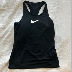 Never Worn Can Fit Womens Xsmall Basic Black Racerback Top, Black Fitted Running Tops, Basic Black Go-dry Tops, Casual Black Tank Top For Running, Functional Black Crew Neck Tank Top, Nike Fitted Tops For Running, Nike Fitted Running Tops, Black Racerback Top With Medium Support, Nike Black Sporty Tank Top