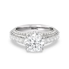 a white gold engagement ring set with diamonds