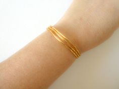 I will just say you NEED these in your life. Sparkly? Versatile? Stretchy? Check, check, check. Plus, it won't break your bank. These sparkly and delicate bracelets come in a set of 3. They are stretchy, made with sparkly gold seed bead and a delicate gold plated bar.Find more stretchy beaded bracelets right here: https://www.etsy.com/shop/StephanieMartinCo/search?search_query=stretchy+braceletℴ=date_desc&view_type=gallery&ref=shop_searchMatching necklaces available here: https://www.ets Minimalist Stretch Bracelet With Tiny Beads As Gift, Minimalist Tiny Beads Stretch Bracelet As Gift, Stretch Bangle Bracelet With Tiny Beads For Gift, Bangle Stretch Bracelet With Tiny Beads For Gift, Gold Stretch Bracelet With Tiny Beads For Gift, Minimalist Adjustable Beaded Bracelet For Bridesmaids, Adjustable Minimalist Beaded Bracelet For Bridesmaids, Dainty Beaded Bracelet With Gold Beads As A Gift, Dainty Beaded Bangle Bracelets