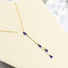 This necklace is created using high-quality Czech glass beads in the shape of smooth teardrops. Nice cobalt blue and gold necklace for you. This necklace features a ring that helps you to regulate the length of the necklace. The chain is brass with an anti-allergenic gold color coating. The length is 20 inches (50 cm). The drop pendant length is 3.75 inches (9.5 cm). 1 Cobalt Blue 2 Bright Blue Matte 3 Light Blue Matte 4 Luster Grey 5 Pink 6 Bright Red 7 Red Matte 8 Ruby Red 9 Emerald Green 10 O Blue And Gold Necklace, Royal Blue Necklace, Drop Jewelry, Necklace Luxury, Women Birthday, Blue Jewelry, Birthday Woman, Blue Necklace, Gift For Wife