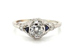 an antique diamond and sapphire engagement ring