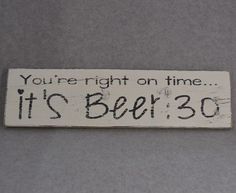 a sign that says you're right on time it's beer 30