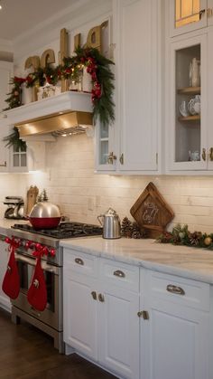 Transform your kitchen into a cozy Christmas haven with these holiday cabinet decorating ideas Get inspired by simple rustic and easy-to-create country-themed decorations in gold red and white Whether you have a spacious kitchen or a small apartment these cute DIY Christmas kitchen decor ideas will add a festive touch to your space