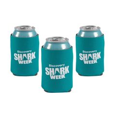 three can coolers with the words discovery shark week printed on them, one in teal and one in white