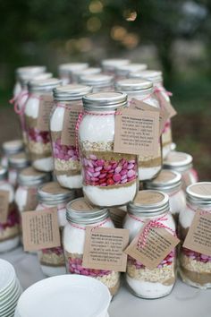 there are many mason jars with labels on them that say it's valentine's day